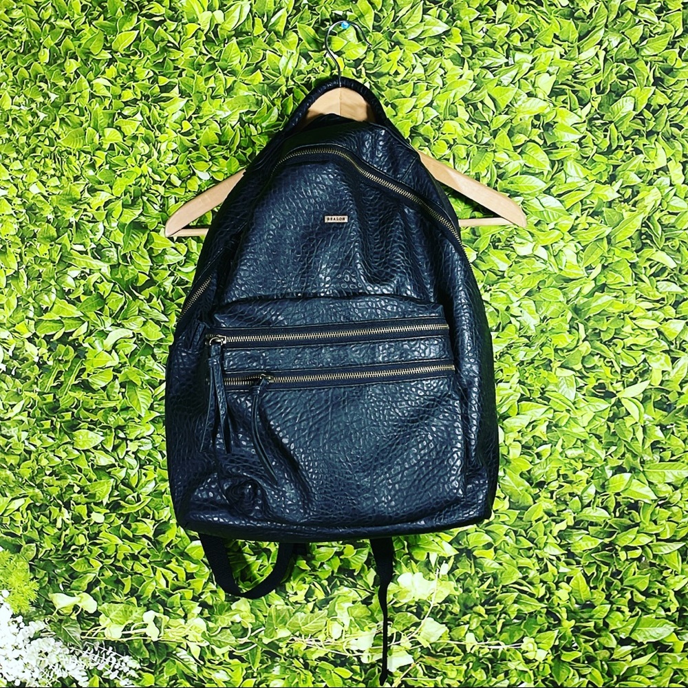 REASON PEBBLE effect leather back back. Near perfect condition.